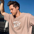 HIIT The Beat Men Oversize Tee Dusk Rose, washed-out print